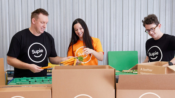 Fruit and vegetables being packed at Supie’s warehouse - Nick, Sarah Balle and Cahan.